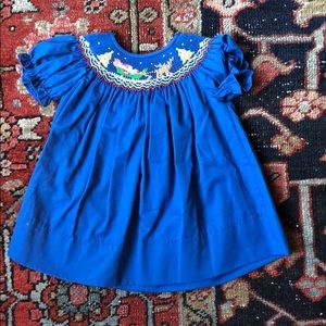 Blue dress with smocked Santa scene 9 months